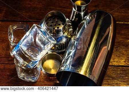 Bar Ustensils, Drink Concept. Cocktail Shaker Accessories On A Wooden Board.