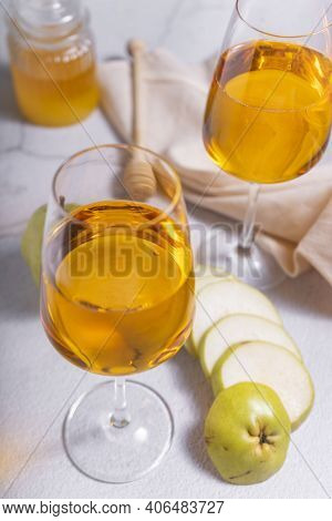 Amber Or Orange Wine Made From White Grapes. In A Tall Wine Glass. Georgian National Wine According 