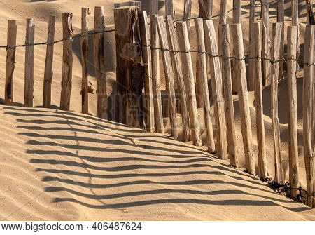 Fencing To Prevent The Erosion Of Sand Dunes At Camber Sands, East Sussex, Uk