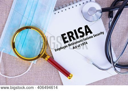Employee Retirement Income Security Act Erisa , The Text Is Written On A Notepad, Next To A Pen, A D