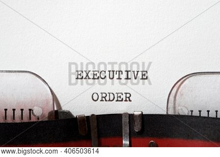 Executive order phrase written with a typewriter.