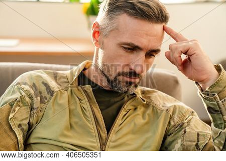 Depressed glum soldier during therapy of depression
