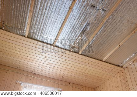 Stage Of Finishing Clapboard Ceiling In A Country House