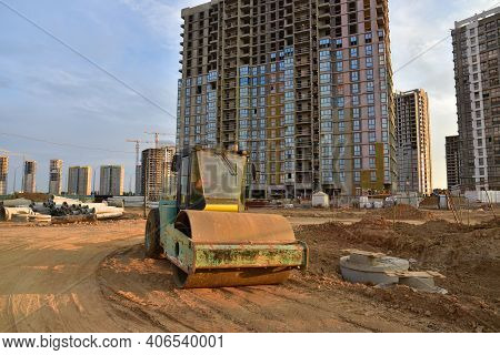 Vibro Roller Soil Compactor Leveling Ground At Construction Site. Vibration Single-cylinder Road Rol