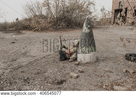 Wandering Boy. Boy With A Gun. Boy Goes To An Abandoned Building. Boy Stands In Front Of A Building.