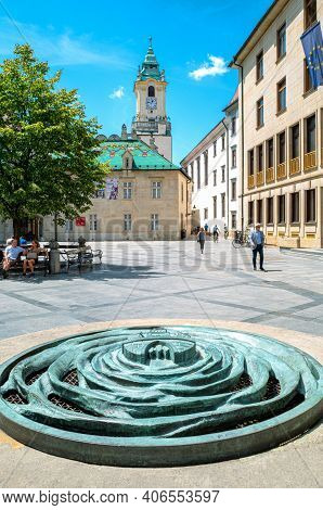 Bratislava, Slovakia - July 8, 2019:  Tourists In Primacialne Square In The Old Town With A Modern F
