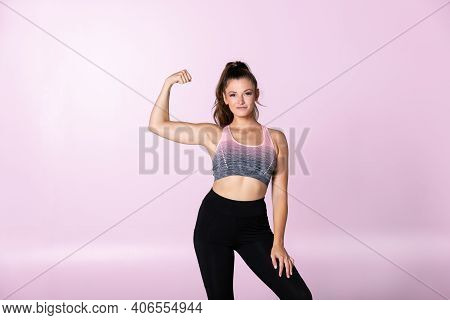 Strong Female Fit Woman Shows Biceps And Flex Muscels, Trainer Finished Workout, Sporty Girl Has Ach