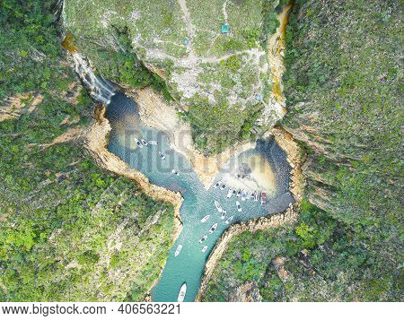 Aerial View Of The Tourist Boats At The Waterfall Of The Canyons Of Furnas At Capitólio - Mg, Brazil