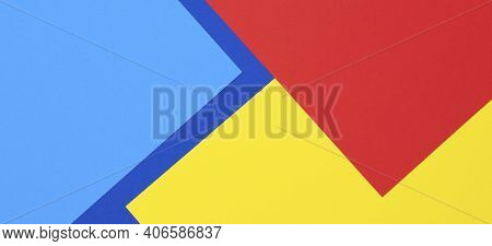 Creative Abstract Blue, Red And Yellow Color Geometric Paper Compositon Background, Top View