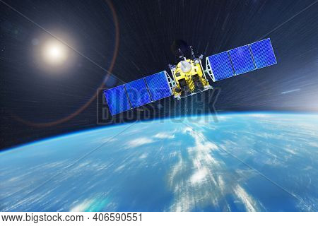 An Orbiting Communications Satellite And Other Researchers With Probes Rushes Into Earth's Orbit. El