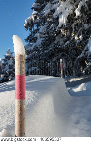 Post At Footpah On Winter Hiking Trail After Snowfall At Davos Switzerland