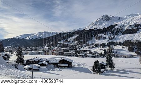 View Into The Valley Of Davos Dorf Including Parsenn With Blue Sky And Plenty Of Snow