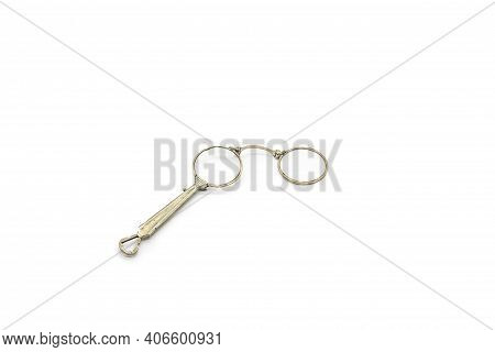 Old Vintage Lorgnette From The Middle Of The Nineteenth Century On The White Background
