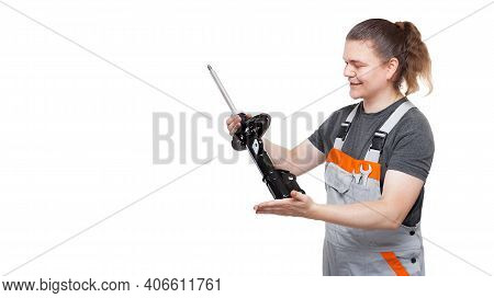Smiling Car Mechanic In Gray Uniform With Spanner Wrench In Pocket Is Holding Ostentatiously In His 