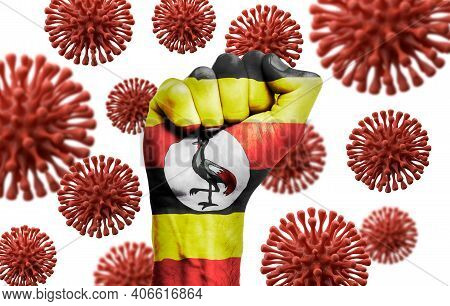 Uganda Flag Fist Fighting Off Coronavius Disease