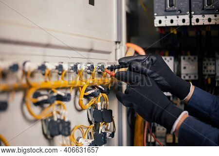 Electrician Engineer Work Tester Measuring Voltage And Current Of Power Electric Line In Electical C