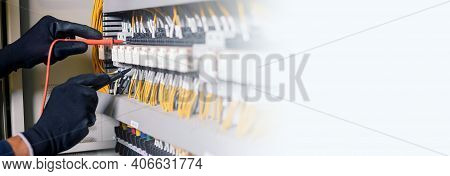 Electrician Engineer Work Tester Measuring Voltage And Current Of Power Electric Line In Electical C