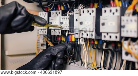Electrician Engineer Work Tester Measuring Voltage And Current Of Power Electric Line In Electical C