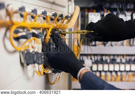 Electrician Engineer Work Tester Measuring Voltage And Current Of Power Electric Line In Electical C