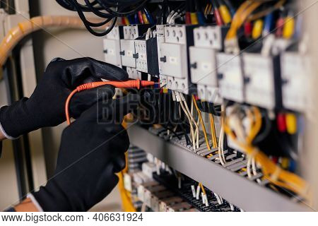 Electrician Engineer Work Tester Measuring Voltage And Current Of Power Electric Line In Electical C