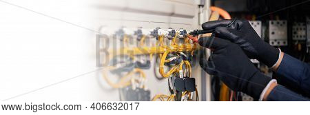 Electrician Engineer Work Tester Measuring Voltage And Current Of Power Electric Line In Electical C