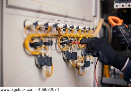 Electrician Engineer Work Tester Measuring Voltage And Current Of Power Electric Line In Electical C