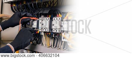 Electrician Engineer Work Tester Measuring Voltage And Current Of Power Electric Line In Electical C