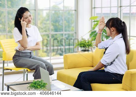 The Sign Language Instructor Teaching A Beautiful Woman To Learn Deaf Language.