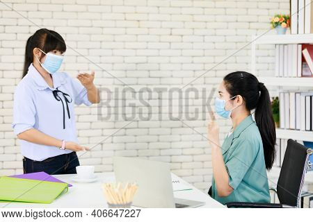 The Office Worker Employees Communicate To Each Other With Hand Signs Or Deaf Language. The Idea For