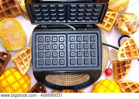 Cooking Waffles In The Kitchen And Homemade Food
