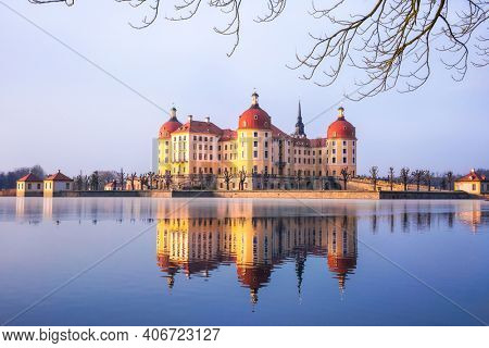 sunrise view in winter on Moritzburg castle named after Duke Moritz of Saxony, Germany