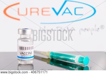 Curevac Logo On The Background Of Bottle Or Vial With Vaccine And Syringe For Injection For Preventi