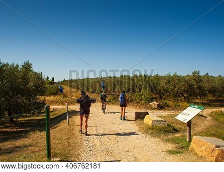 Strunian, Slovenia - September, 19: Rearview Of A Couple Of Girl Hikers With Backpacks Walking While