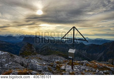 Summit Cross With View Of A Mountain, Photo From The Mountain Peak Mutteristock Glarus. Swiss Mounta