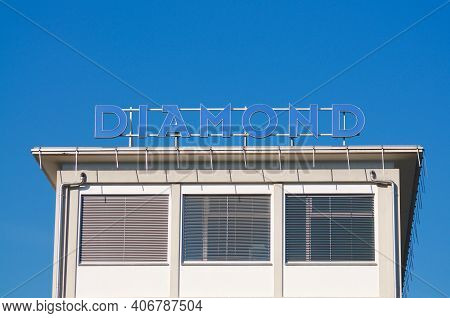 Locarno, Ticino, Switzerland - 16th January 2021 : Diamond Sa Company Sign Hanging On The Building I