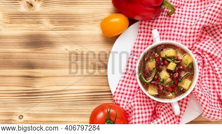 Delicious Bean Soup With Meat On A Wooden Background. Copy Space. Top View.