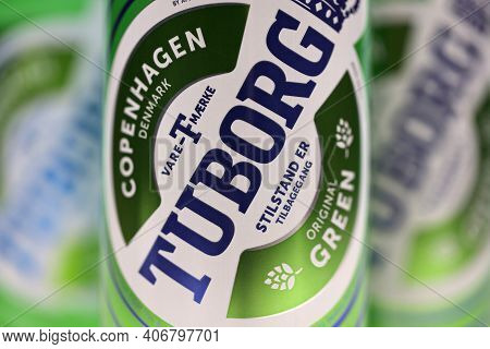 Kharkov, Ukraine - December 8, 2020: Aluminium Cans Of Green Tuborg Beer On Wooden Background. Tubor