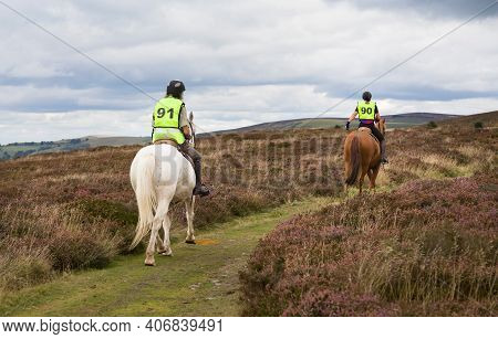 Shropshire, Uk - September 08, 2013. Two People Pony Trekking On Long Mynd, Shropshire Hills, Uk