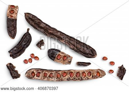 Ripe Carob Pods And Bean Isolated On White Background With Clipping Path. Top View With Copy Space F