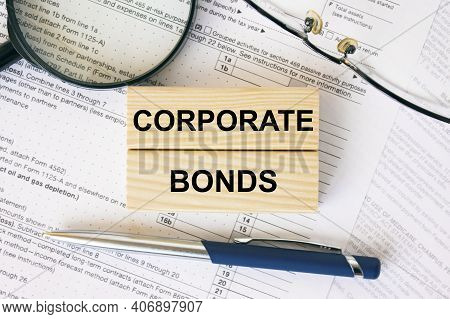 Wooden Blocks With Text Corporate Bonds On Financial Docs