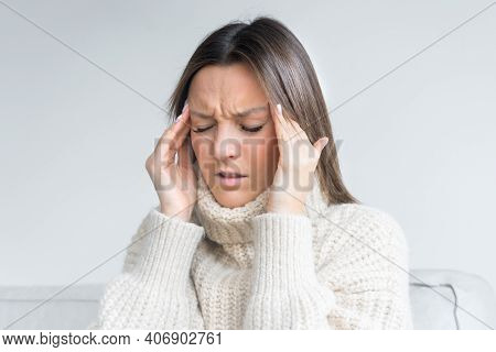 Young Woman Touching Her Temples Because Of Strong Tension Headache. Cluster Headache. Female Suffer