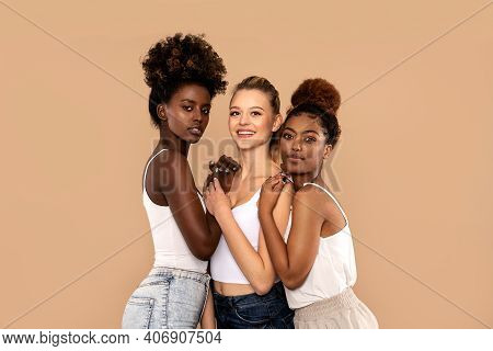 Three Beautiful Multi Ethnic Women Posing Together, Looking At Camera. Beauty Portrait Of Two Afro G