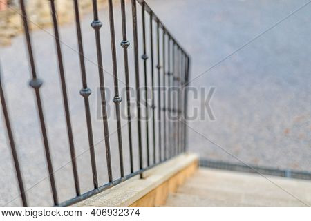 Steps Of The House, Detail Of Wrought Iron Railing With Beautiful Ornaments