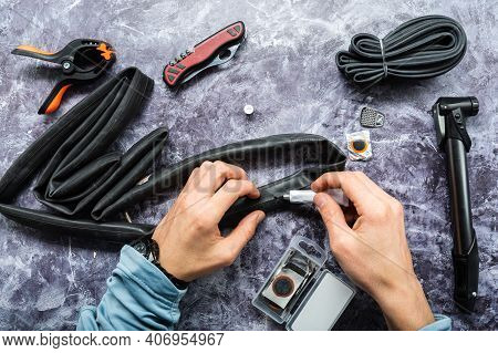 A Hole In The Bike Chamber. Bicycle Camera Repair. Seal The Hole In The Bike Tube. Top.