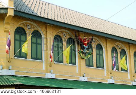 Thai Royal Garuda Emblem With The Phrase 'by Appointment To His Majesty The King' On The Facade Of T