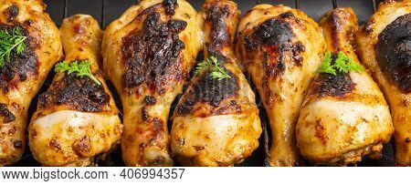 Fried Chicken Drumsticks Marinated In Red Marinade With Turmeric, Garlic, Mustard And Parsley. Chick