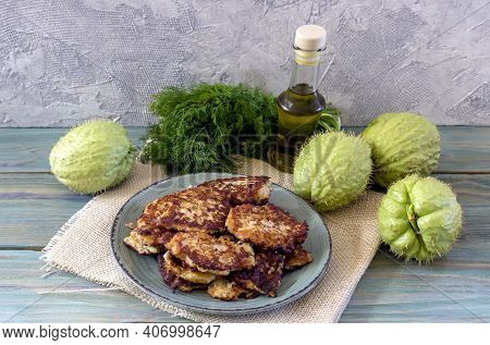 The Fruits Of Mexican, Healthy Liana (sechium Edule) And Pancakes From It, Dill And Olive Oil On Woo