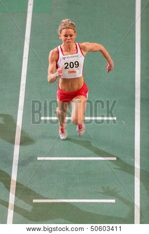VIENNA, AUSTRIA - JANUARY 29 Hayley Jones (#209 Great Britain) places 2nd in the women's 60m event on January 29, 2013 in Vienna, Austria.