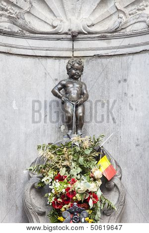 Manneken Pis Statue In The Centre Of Brussels.