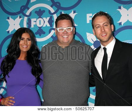 LOS ANGELES - SEP 9:  Natasha Crnjac, Graham Elliot, Luca Manfe at the FOX Fall Eco-Casino Party at The Bungalow on September 9, 2013 in Santa Monica, CA